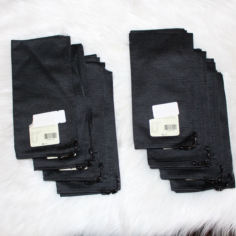 8 fabric black dinner napkins with beading on 1 corner